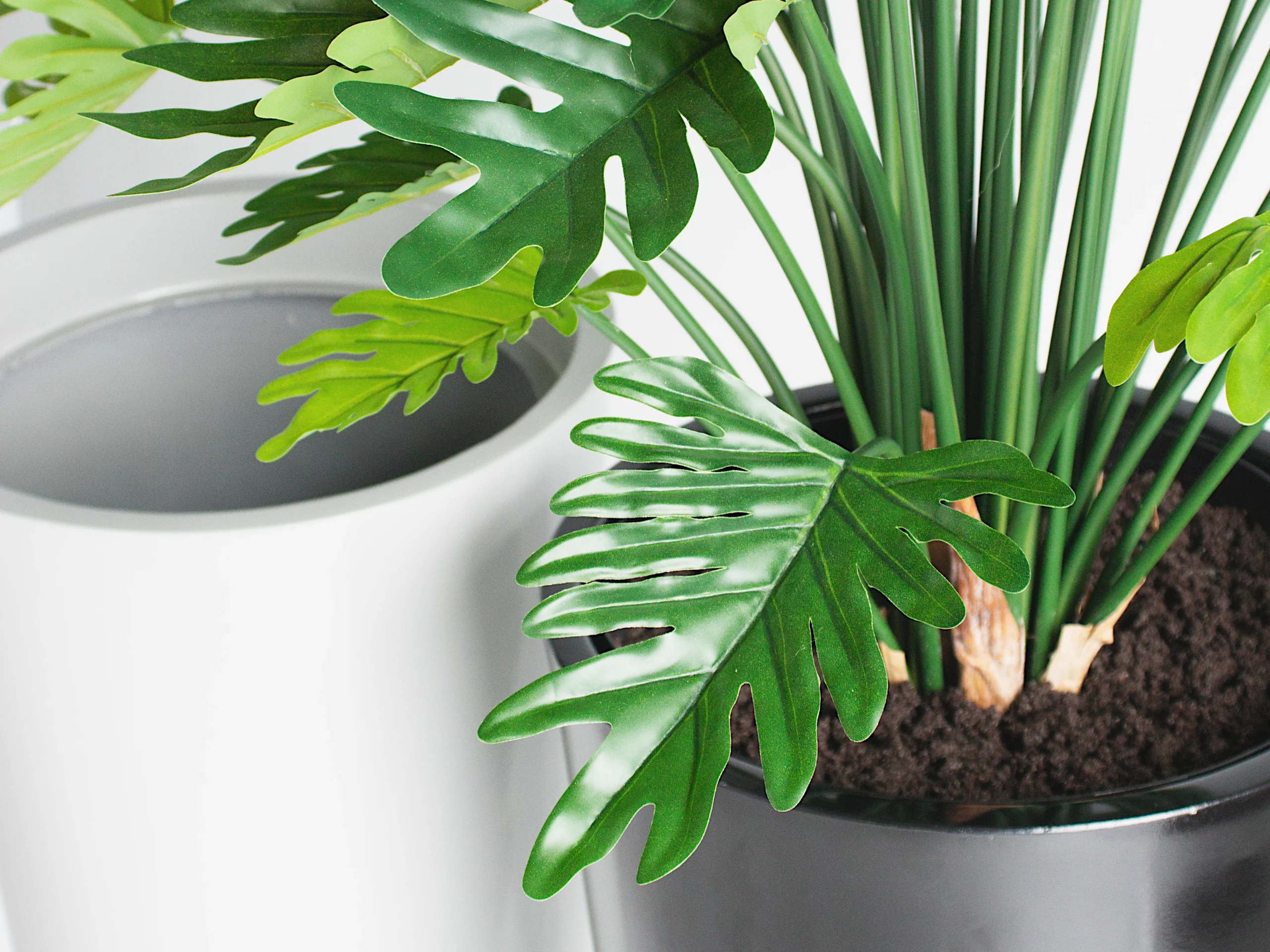 faux philodendron plant in office planter